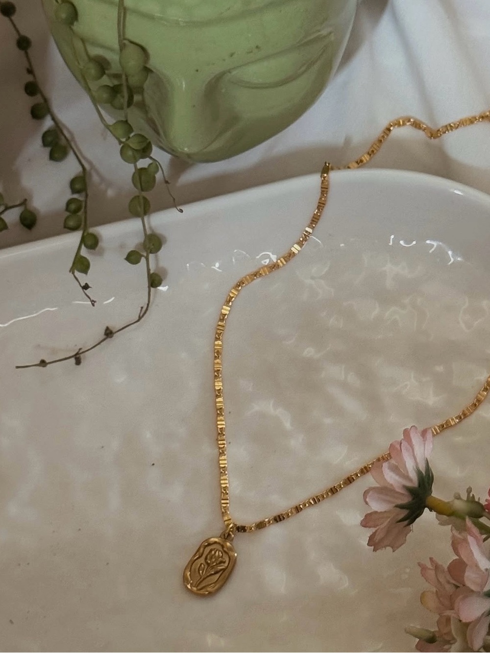 Gold Pendant Necklace with Floral Medallion